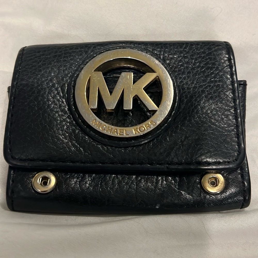 Michael kohrs black leather wallet